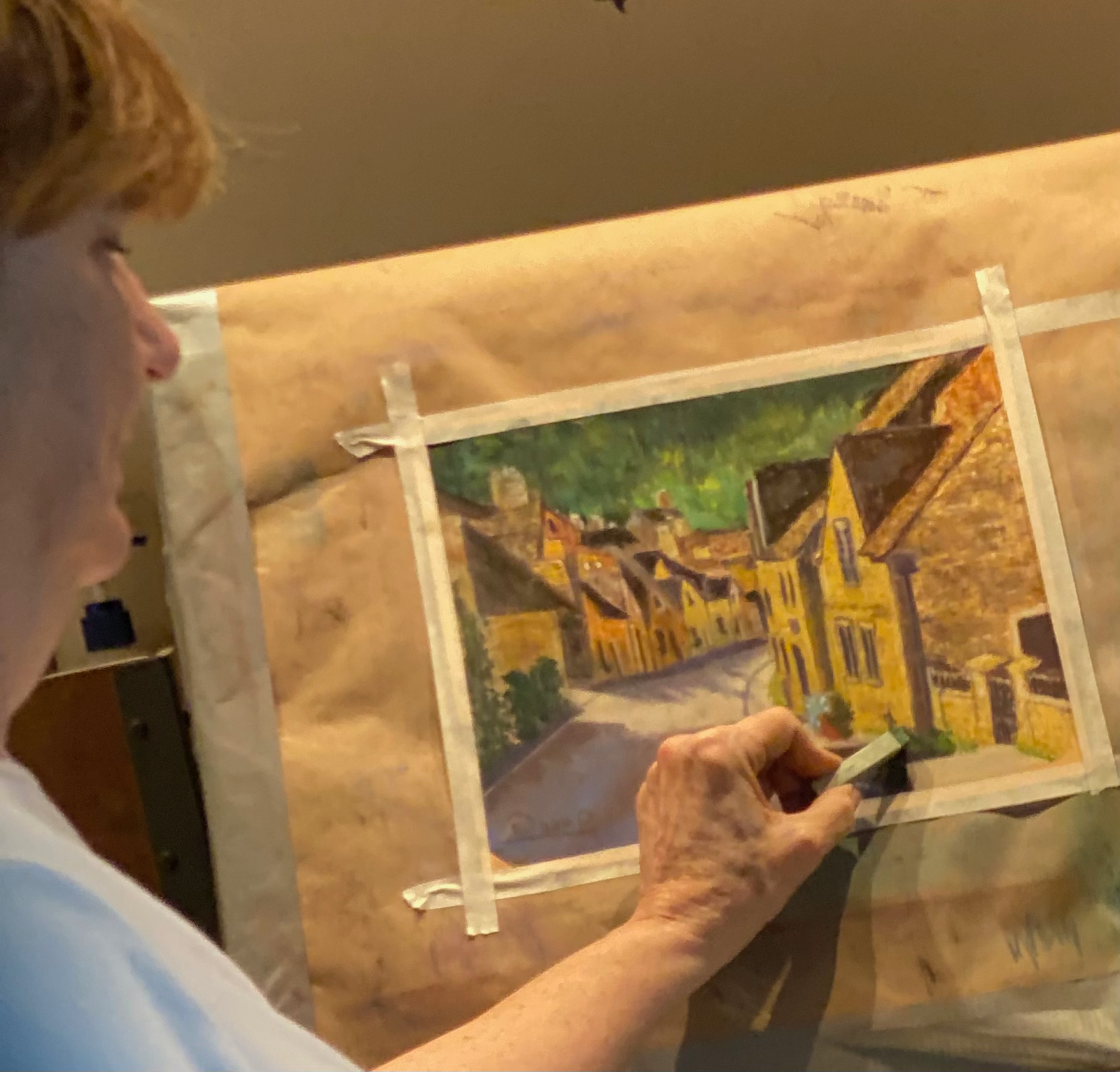DawnE's pastel paintings displayed at an art show